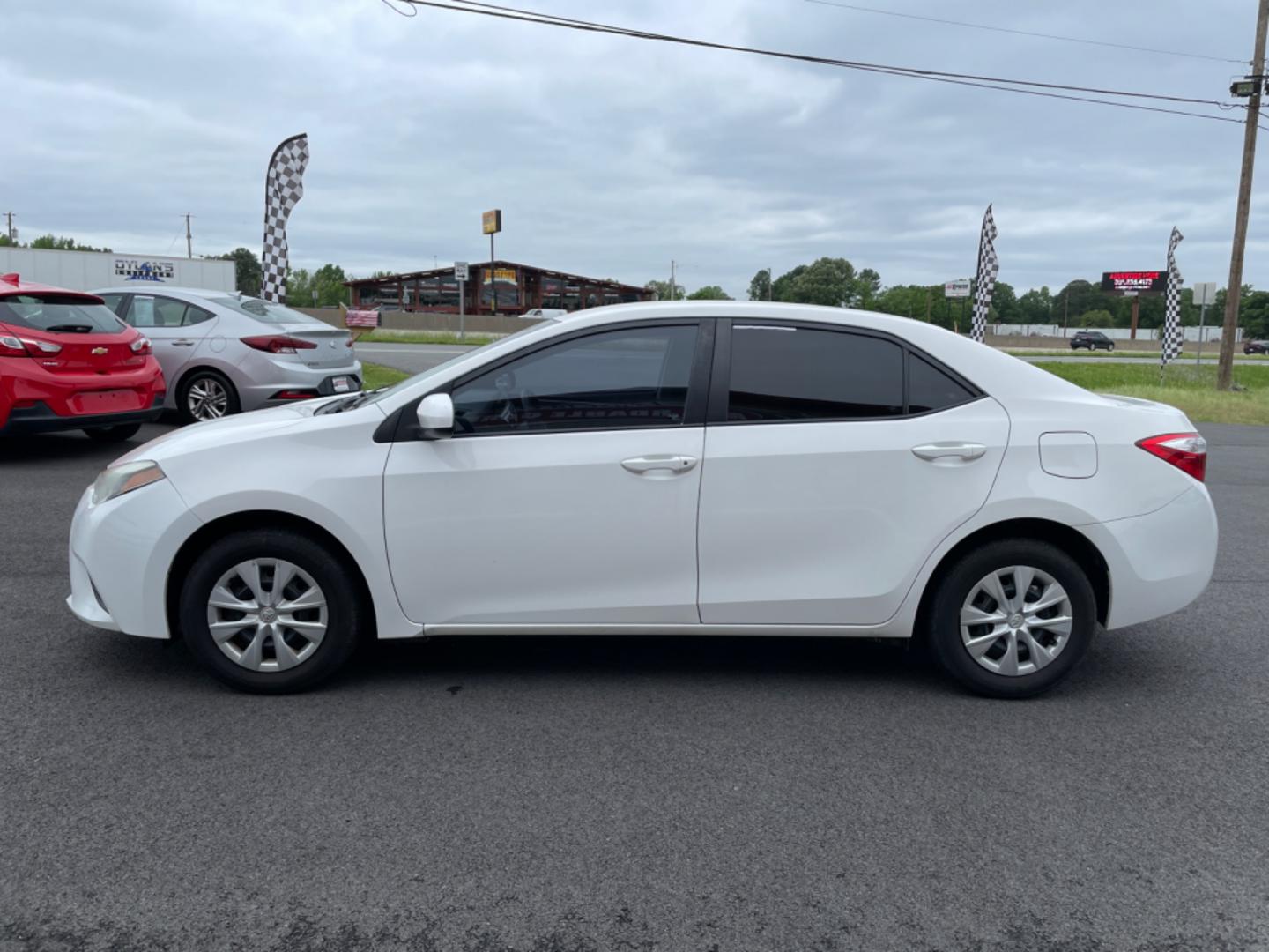 2016 White Toyota Corolla (5YFBURHE8GP) with an 4-Cyl, 1.8 Liter engine, Automatic, CVTi-S transmission, located at 8008 Warden Rd, Sherwood, AR, 72120, (501) 801-6100, 34.830078, -92.186684 - Photo#4